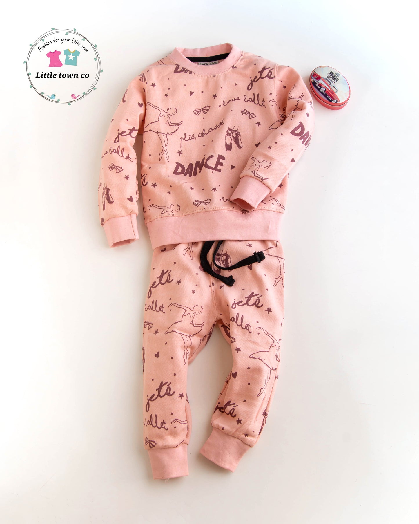 Dance print peach colour tracksuit for girls