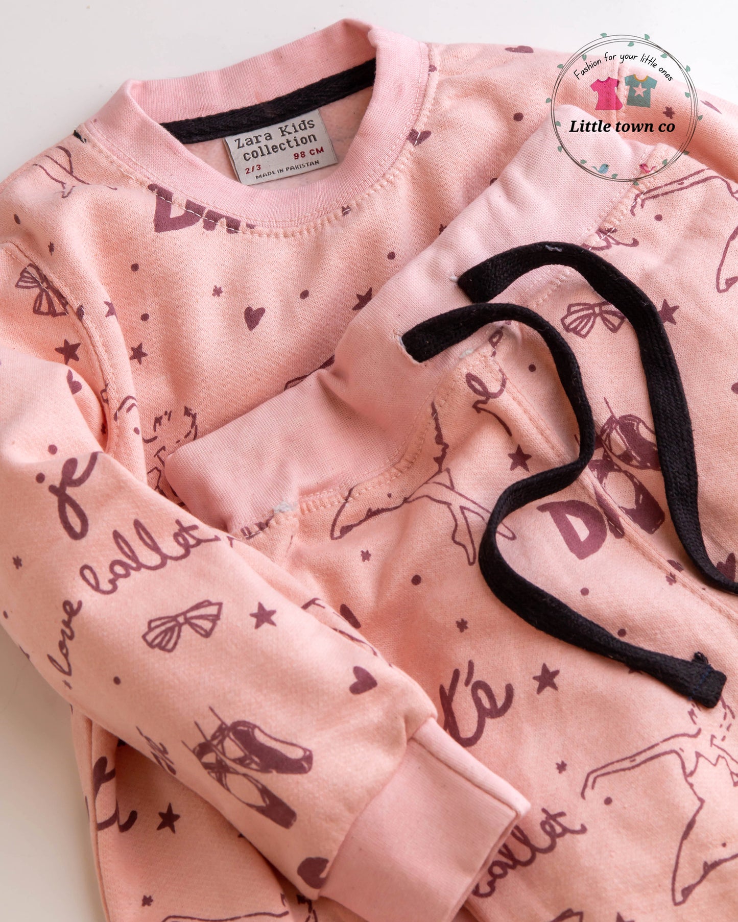 Dance print peach colour tracksuit for girls